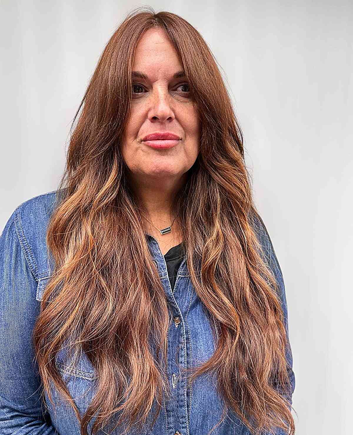19 Trendy & Easy Long Hairstyles for Women Over 50
