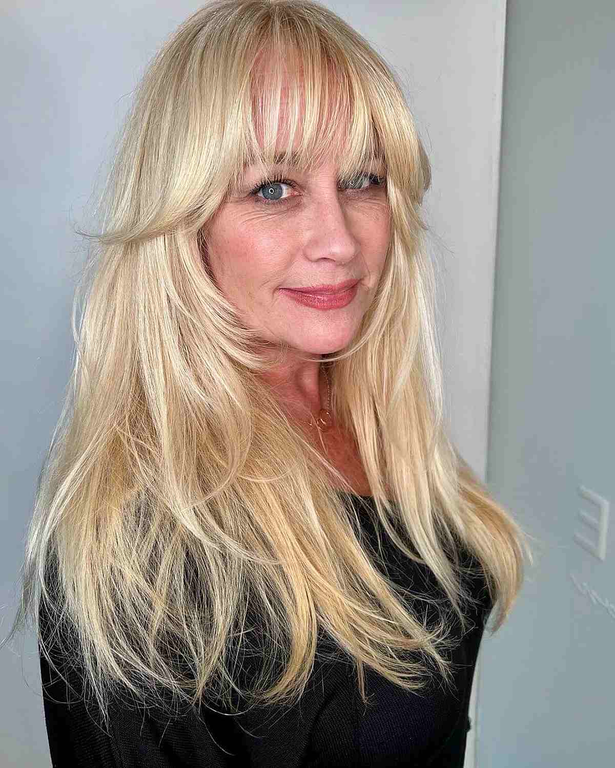19 Trendy & Easy Long Hairstyles for Women Over 50