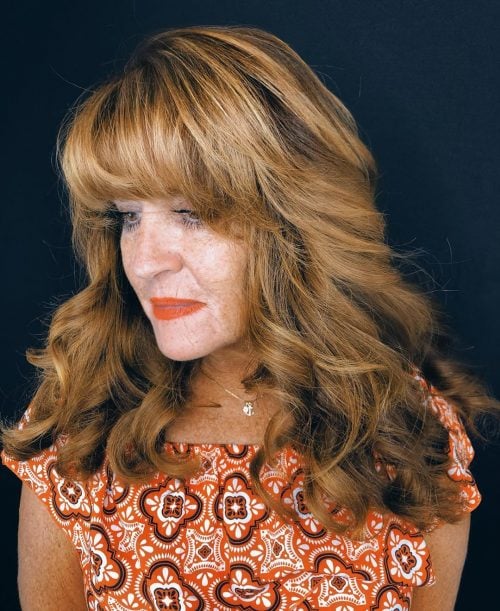 19 Trendy & Easy Long Hairstyles for Women Over 50
