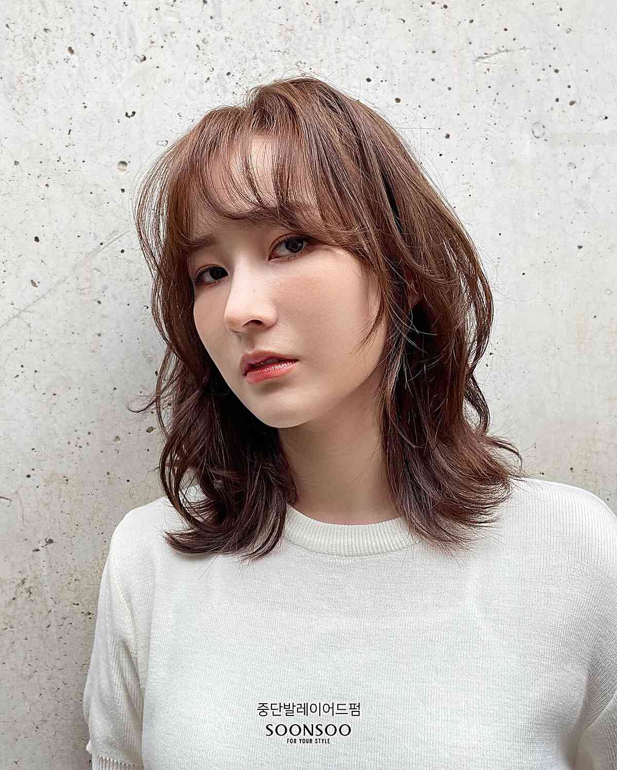 Top 50 Medium-Short Haircuts for Women Trending in 2025