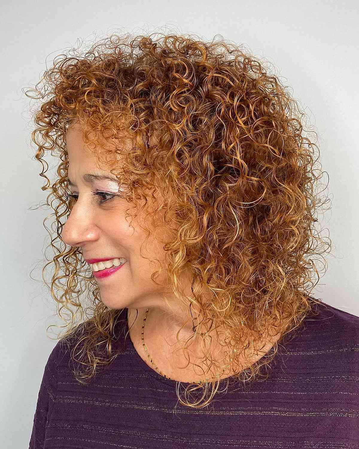 The Best Shoulder-Length Curly Hair Cuts & Styles in 2025