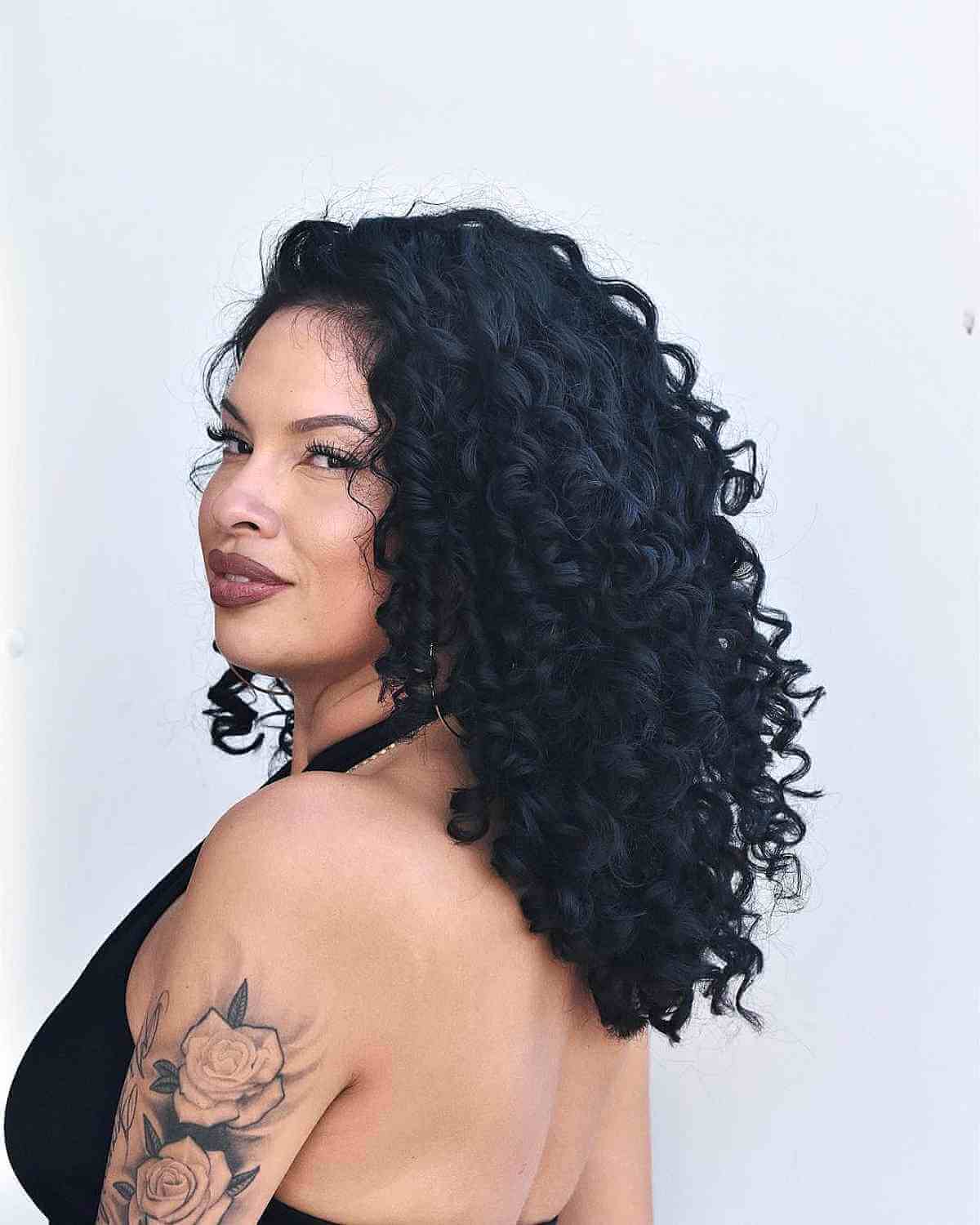 The Best Shoulder-Length Curly Hair Cuts & Styles in 2025