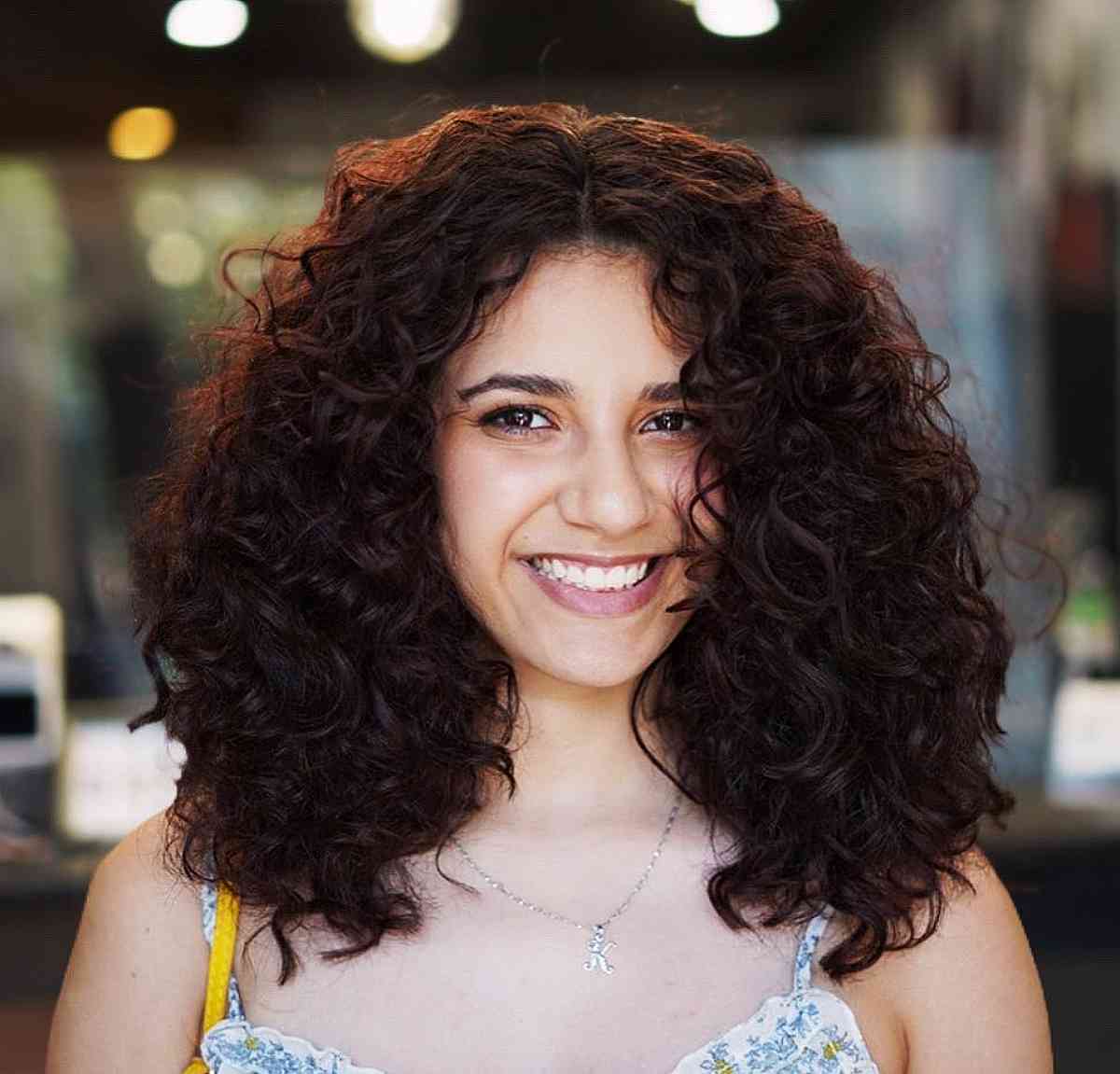 The Best Shoulder-Length Curly Hair Cuts & Styles in 2025