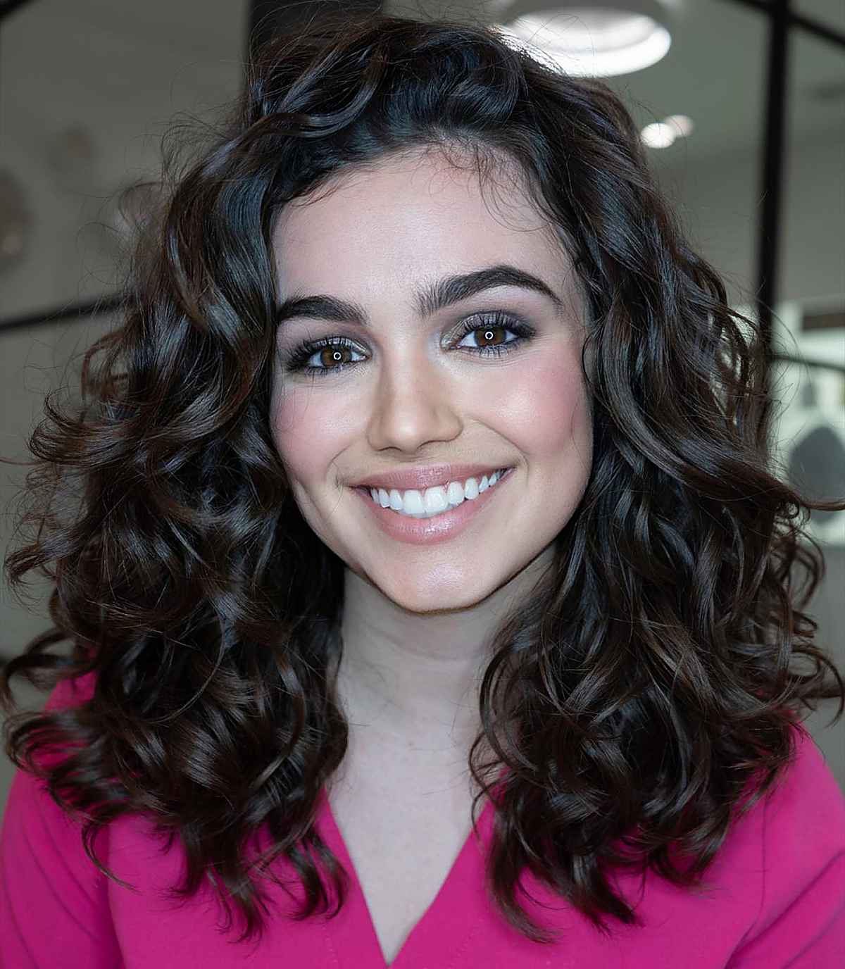 The Best Shoulder-Length Curly Hair Cuts & Styles in 2025