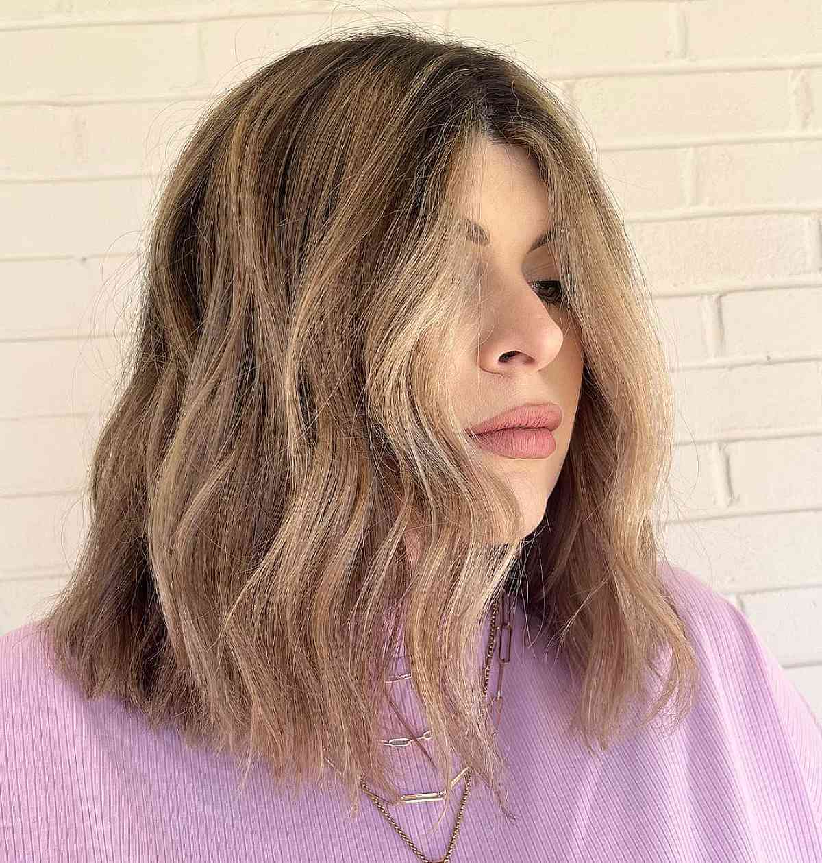 The Top 33 Medium Hairstyles For Oval Faces in 2025