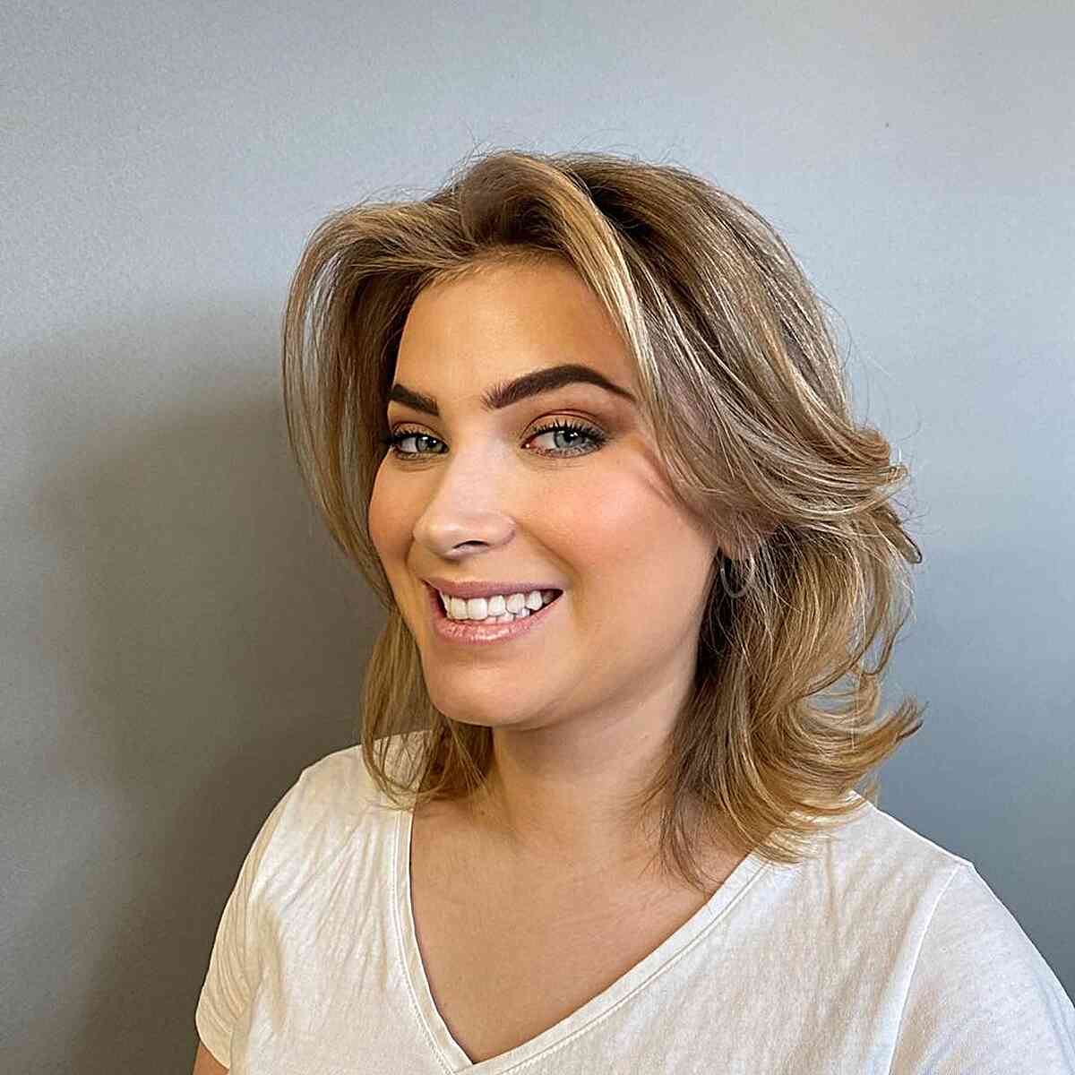 The Top 33 Medium Hairstyles For Oval Faces in 2025
