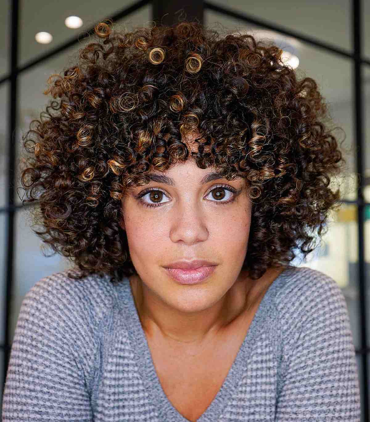 47 Best Short Curly Hair with Bangs to Try This Year