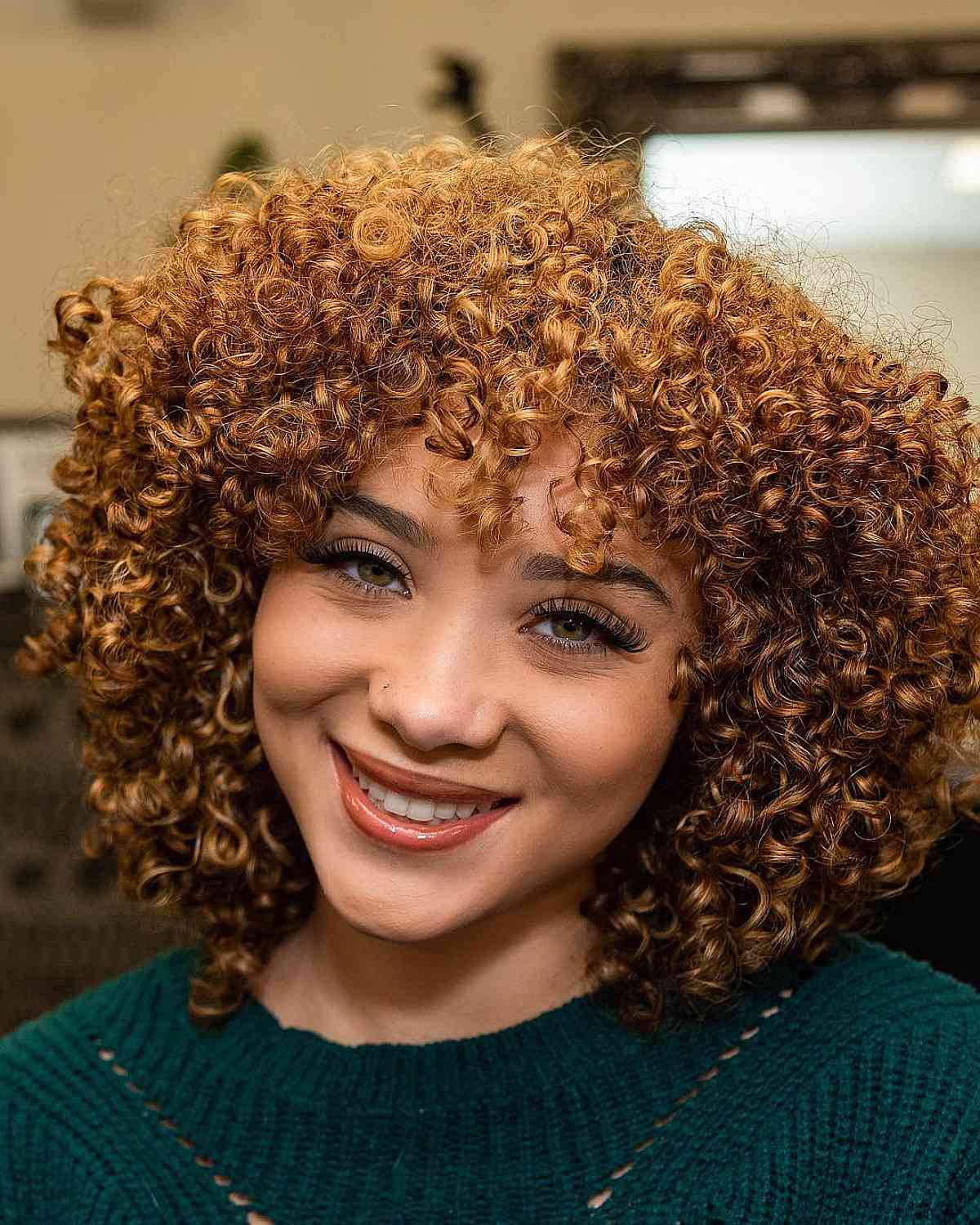47 Best Short Curly Hair with Bangs to Try This Year