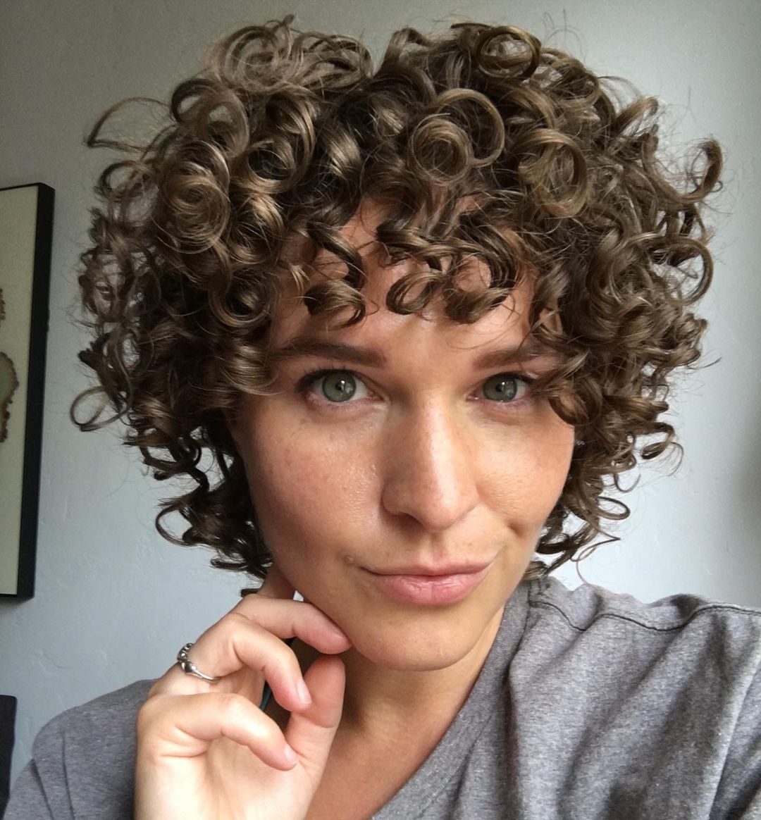 47 Best Short Curly Hair with Bangs to Try This Year