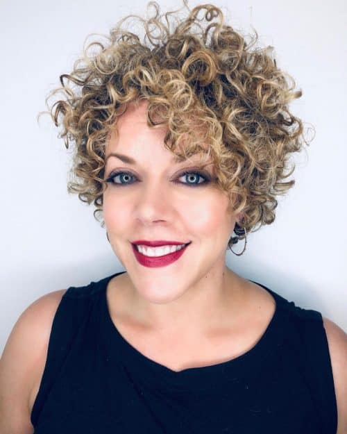 47 Best Short Curly Hair with Bangs to Try This Year