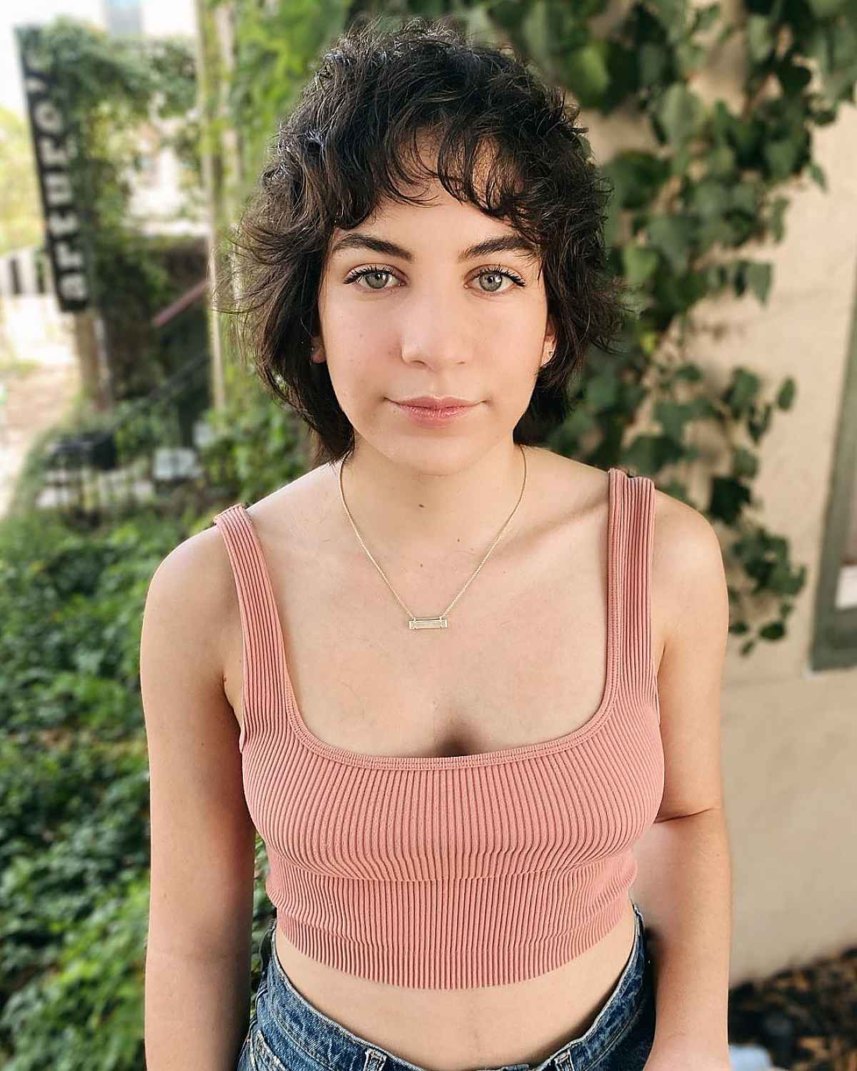 47 Best Short Curly Hair with Bangs to Try This Year
