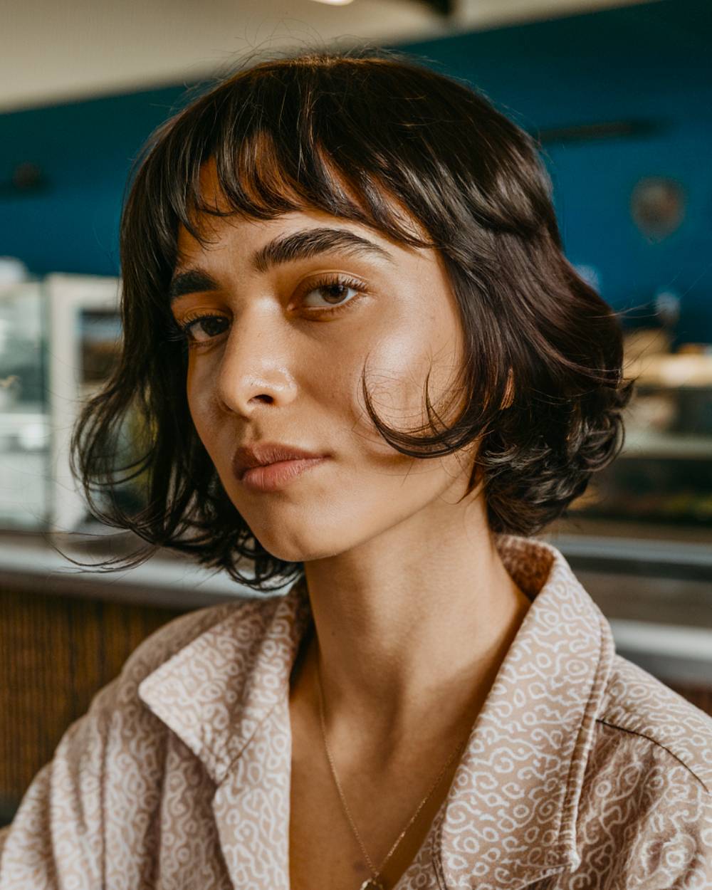 15+ Effortlessly Cool Enby Haircuts to Try in 2025