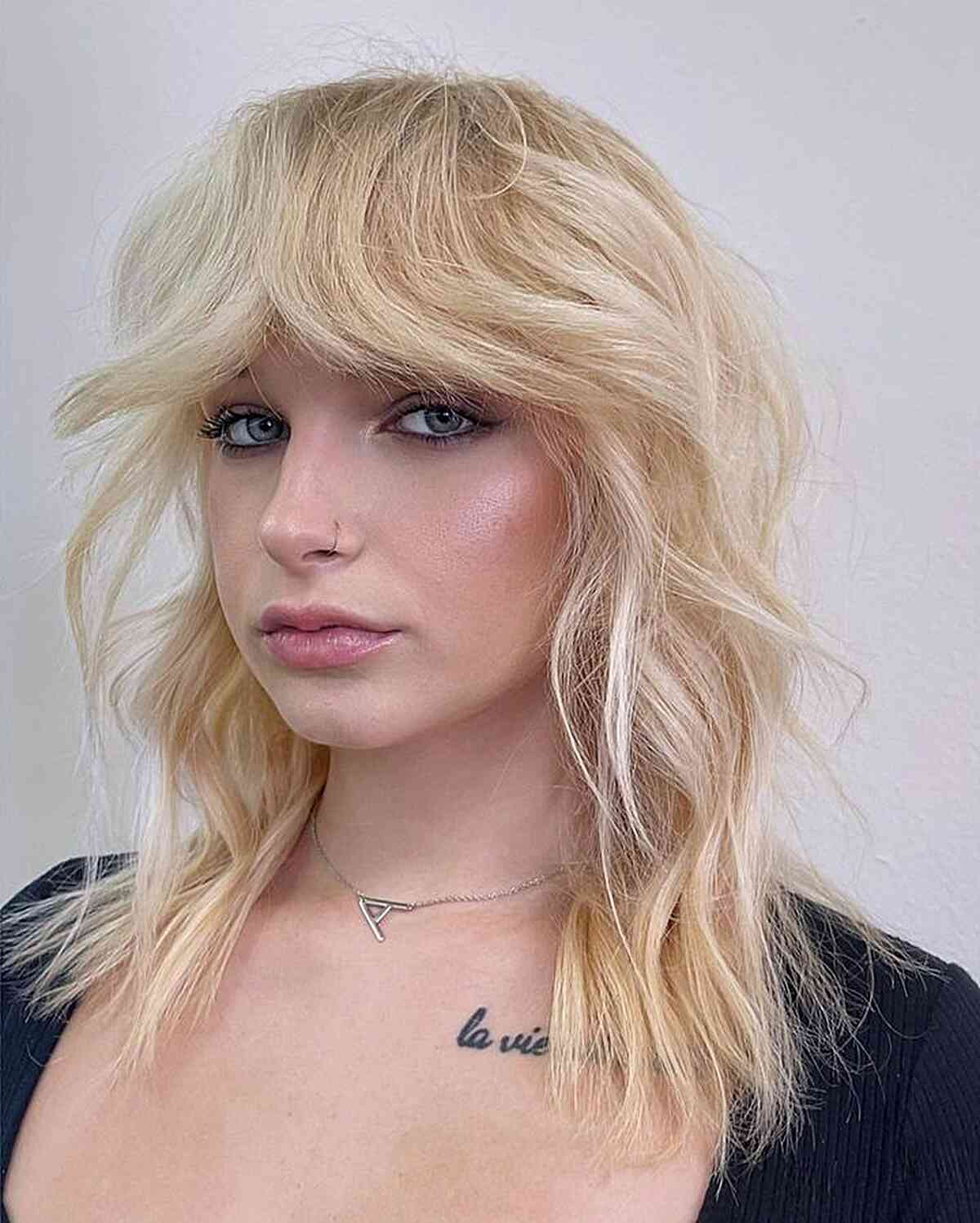 43 On-Trend Ways to Get a Shag with Curtain Bangs