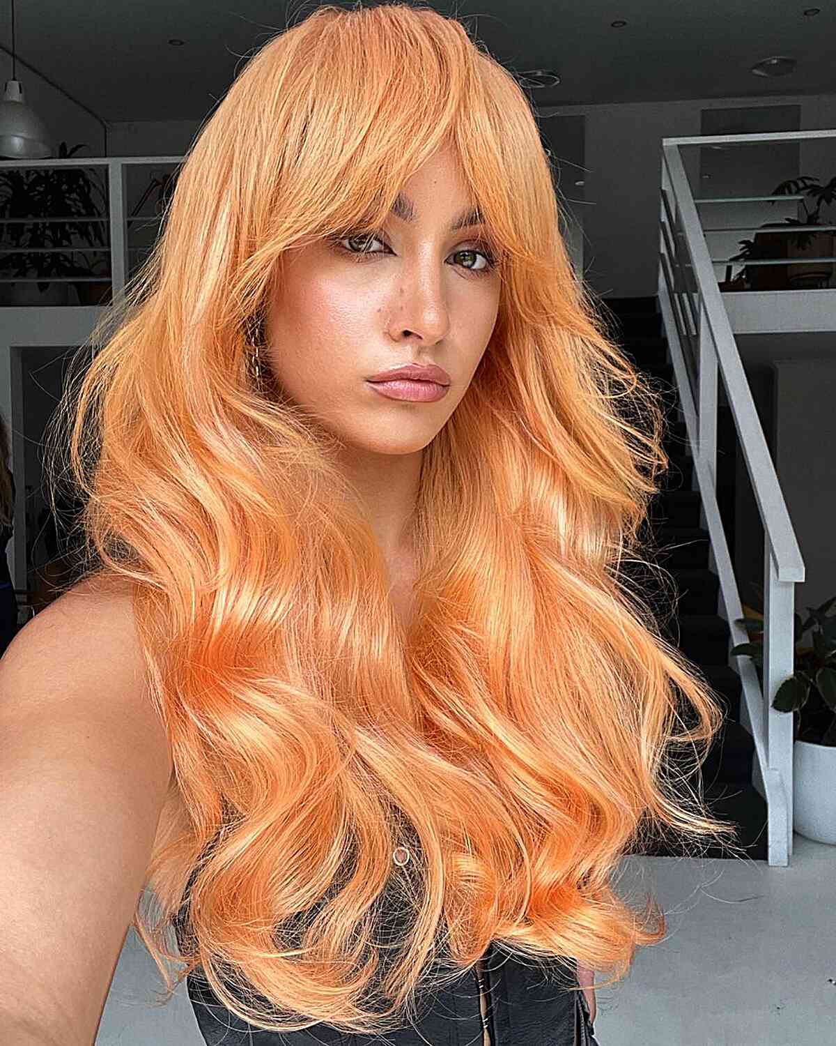 40 Trendy Ways to Get Bottleneck Bangs Right Now