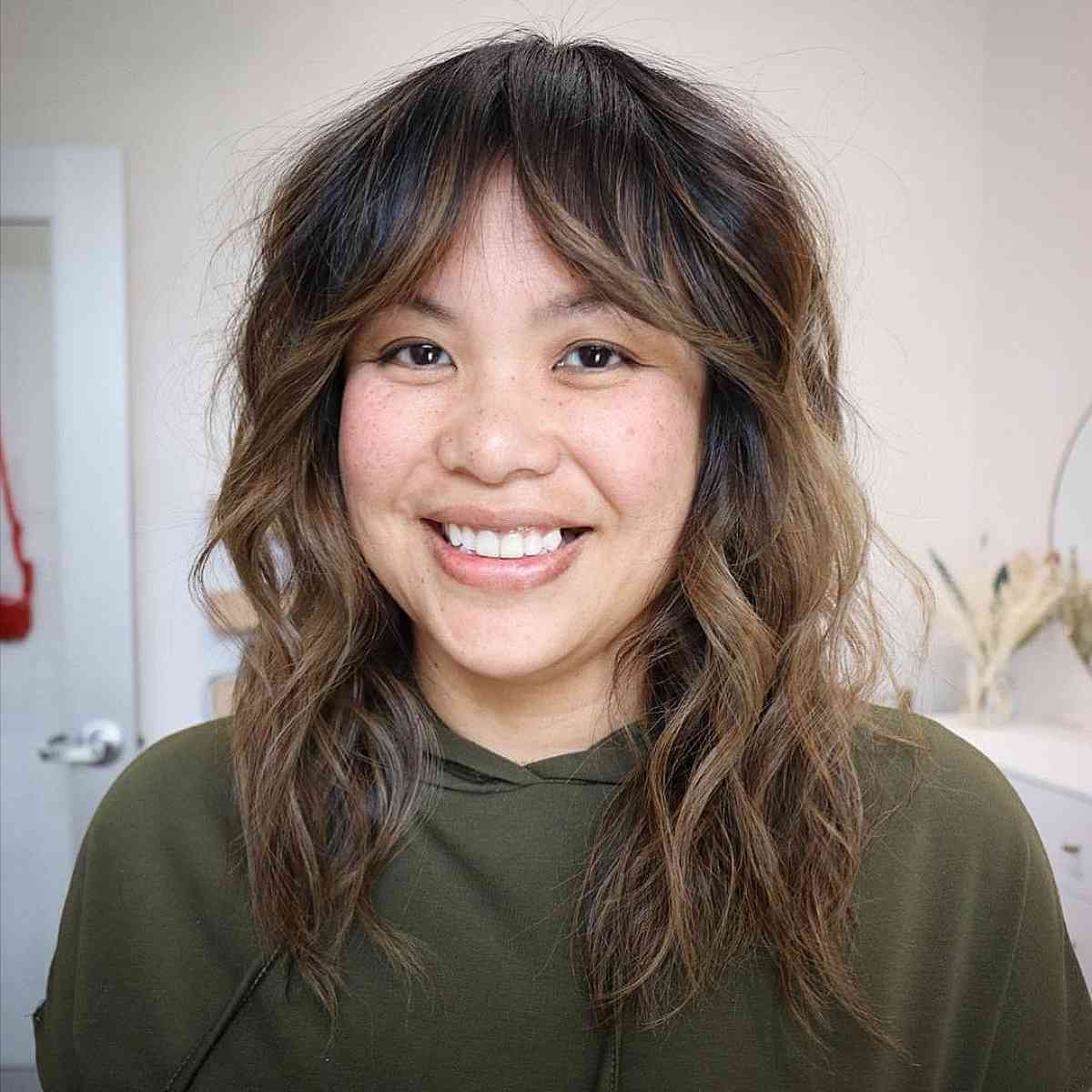 40 Trendy Ways to Get Bottleneck Bangs Right Now