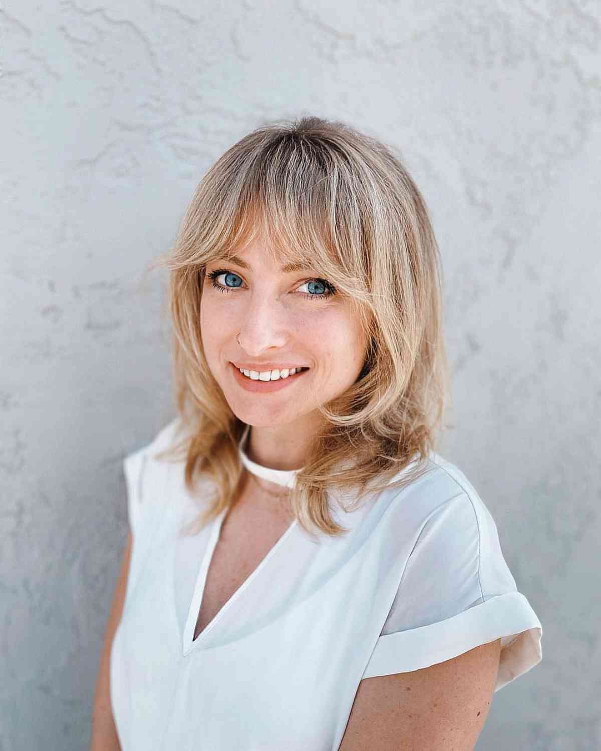 40 Trendy Ways to Get Bottleneck Bangs Right Now