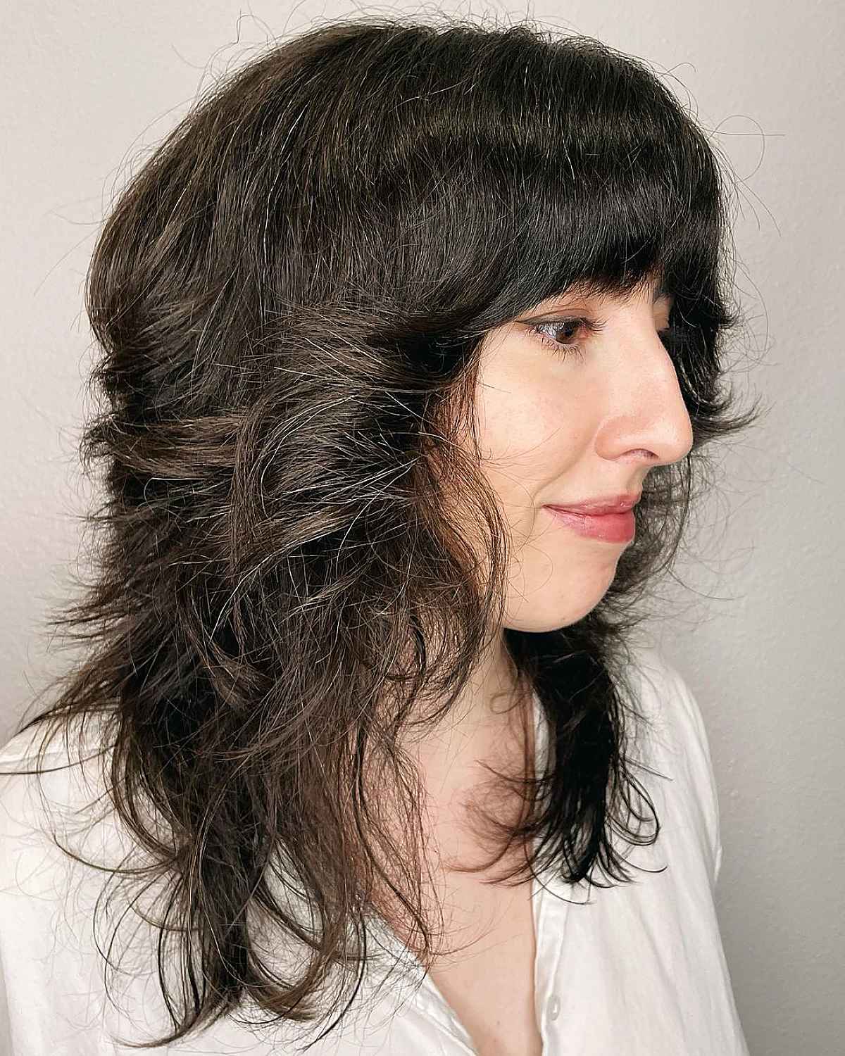35 Greatest Ways to Pair a Wolf Cut with Bangs