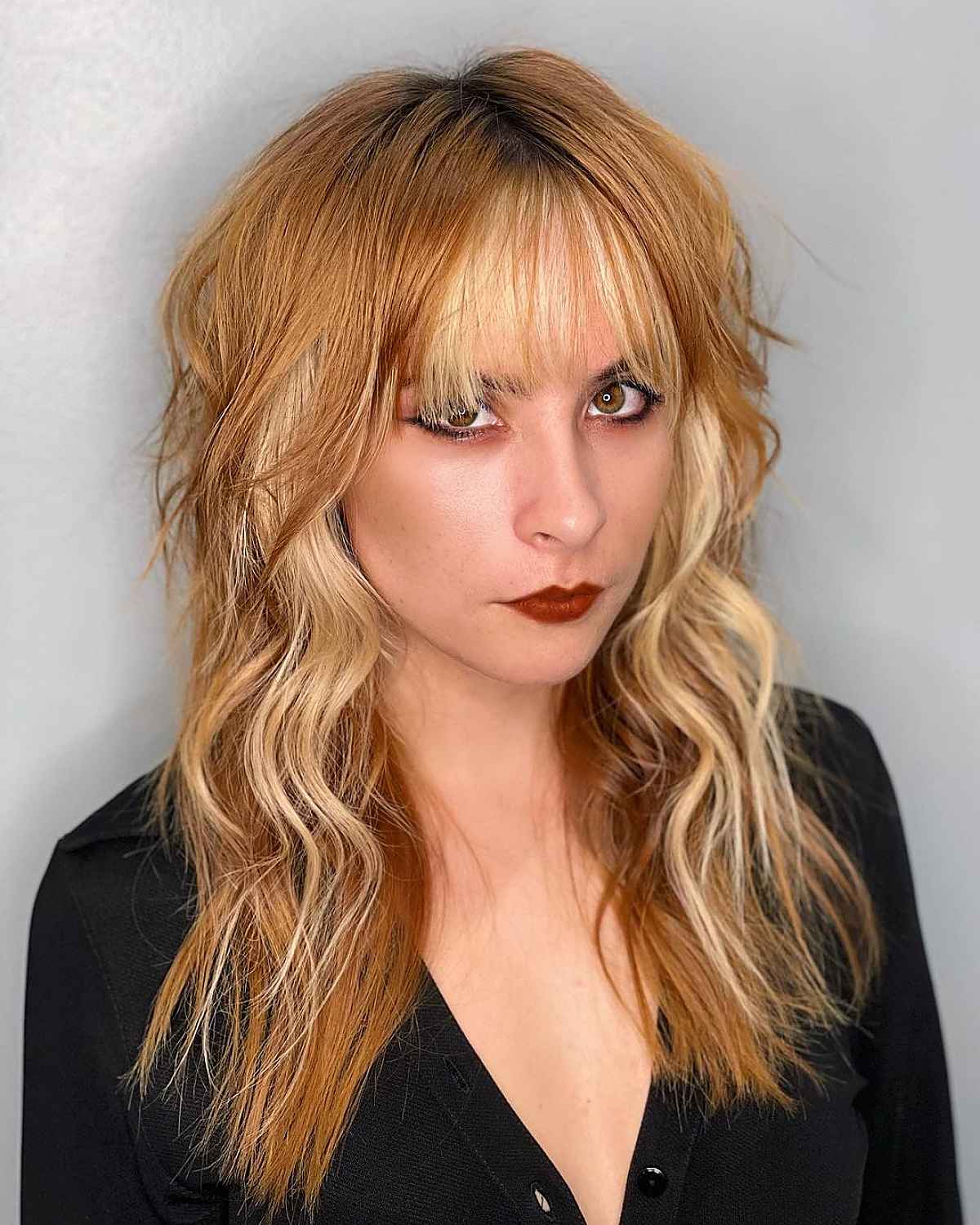 35 Greatest Ways to Pair a Wolf Cut with Bangs