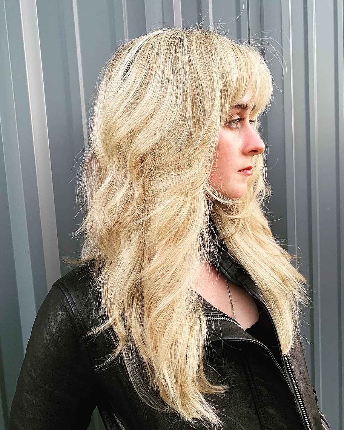 35 Greatest Ways to Pair a Wolf Cut with Bangs