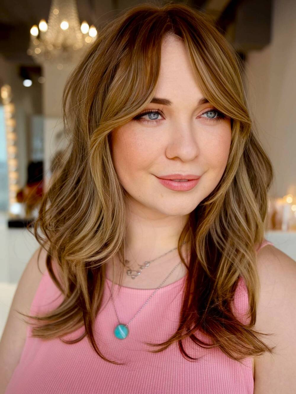 15+ Flattering Wavy Hair with Bangs Styles for Round Faces in 2025