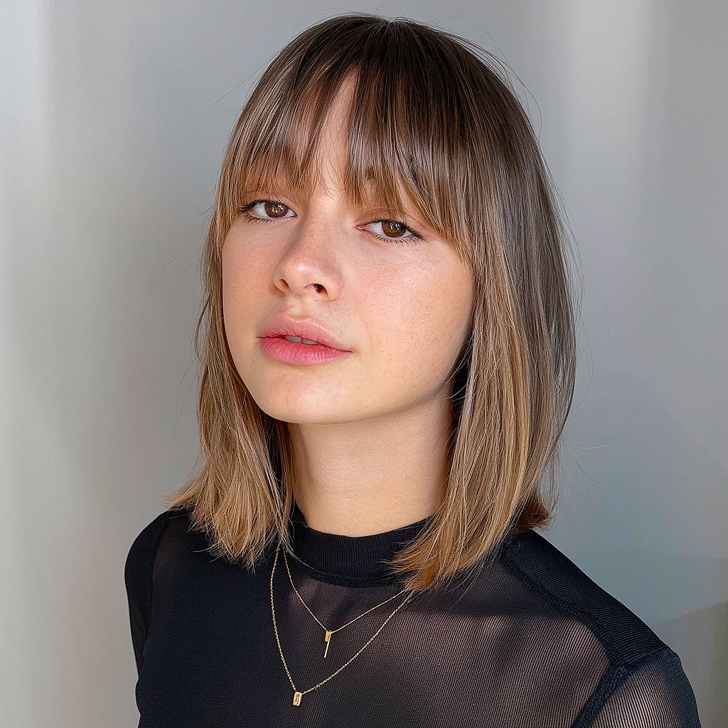 15+ Flattering Bangs for Oval Faces That Are Perfect for 2025
