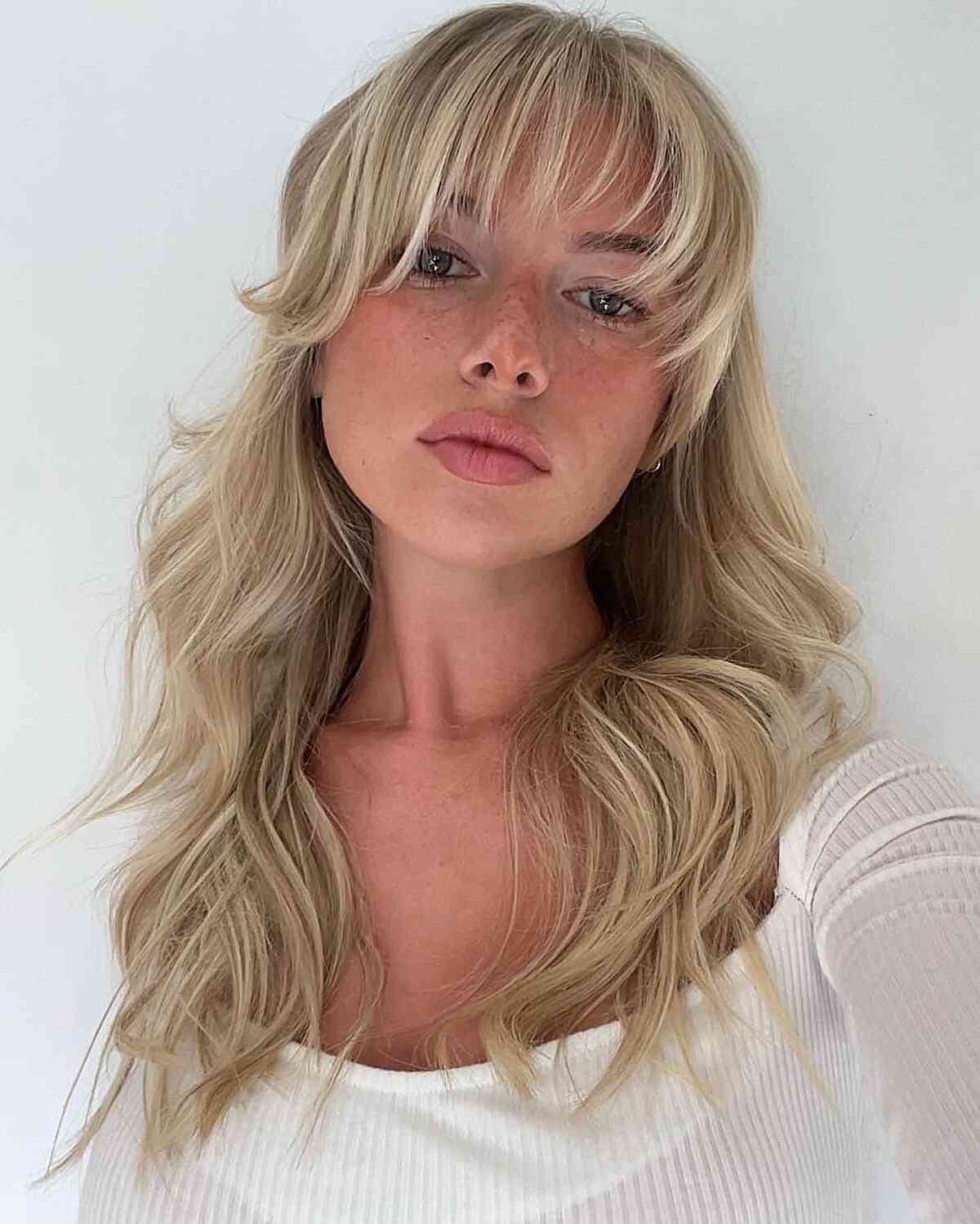 47 Trendy Wispy Bangs for 2025 & How to Match to Your Face Shape
