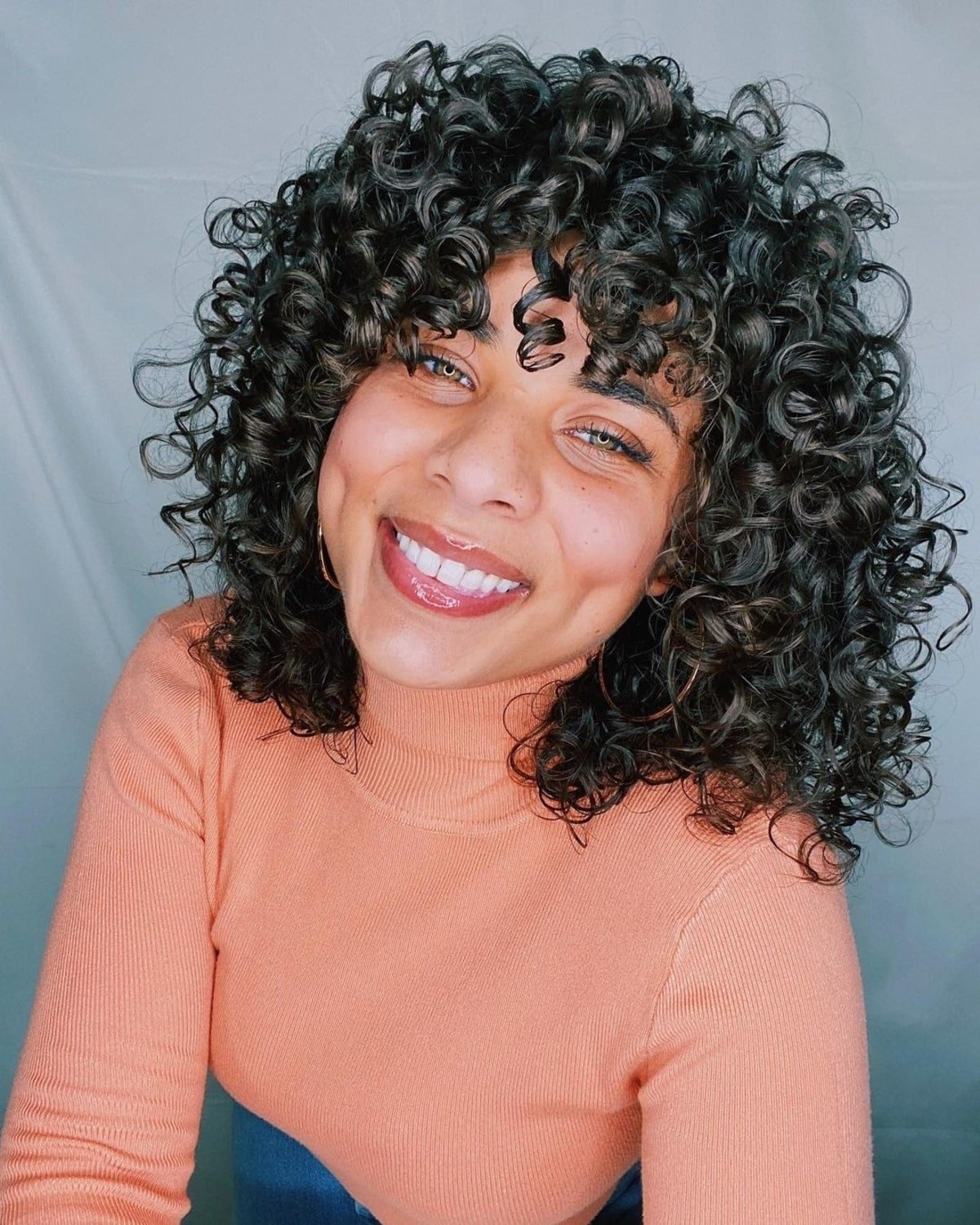 91 Best Ways to Pair Curly Hair with Bangs