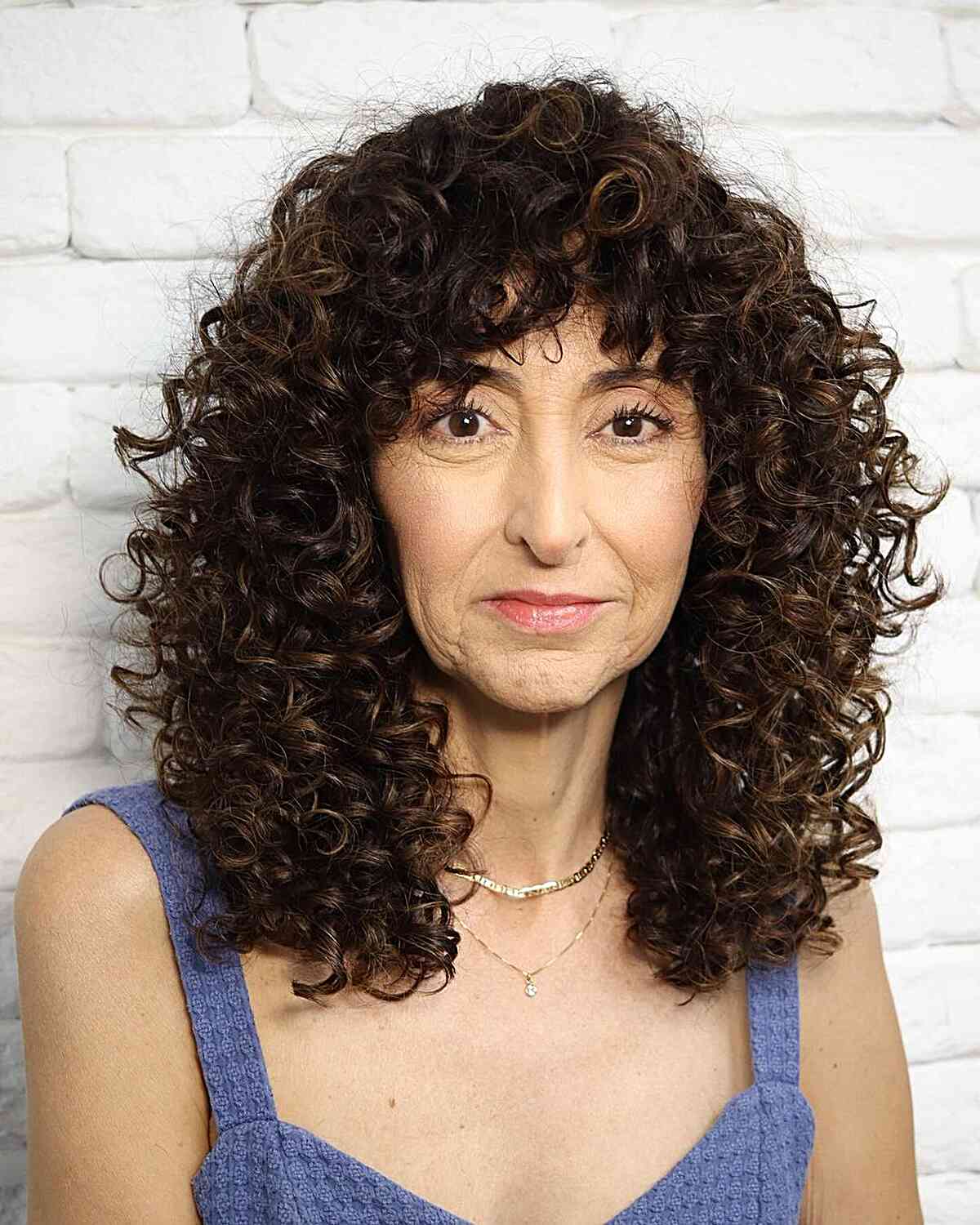 Curls That Wow: 27 Hairdos for Women Over 60 with Curly Hair
