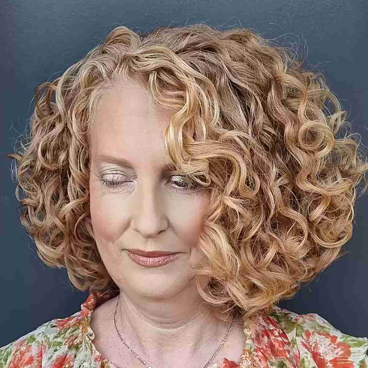 Curls That Wow: 27 Hairdos for Women Over 60 with Curly Hair