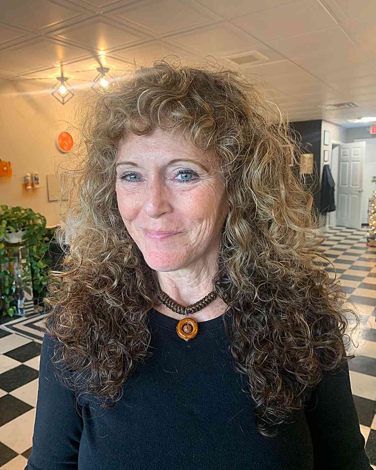 Curls That Wow: 27 Hairdos for Women Over 60 with Curly Hair