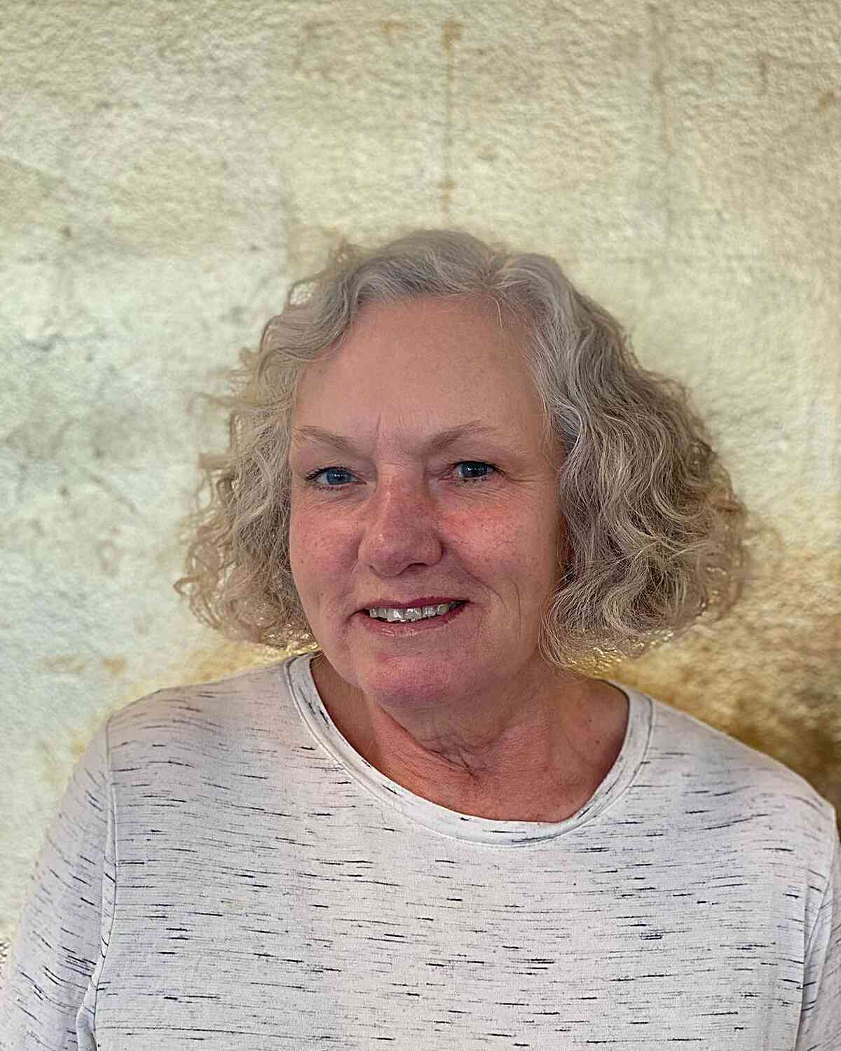 Curls That Wow: 27 Hairdos for Women Over 60 with Curly Hair