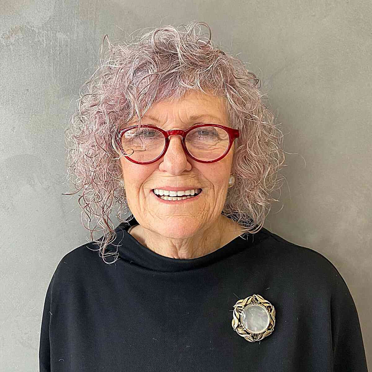 Curls That Wow: 27 Hairdos for Women Over 60 with Curly Hair