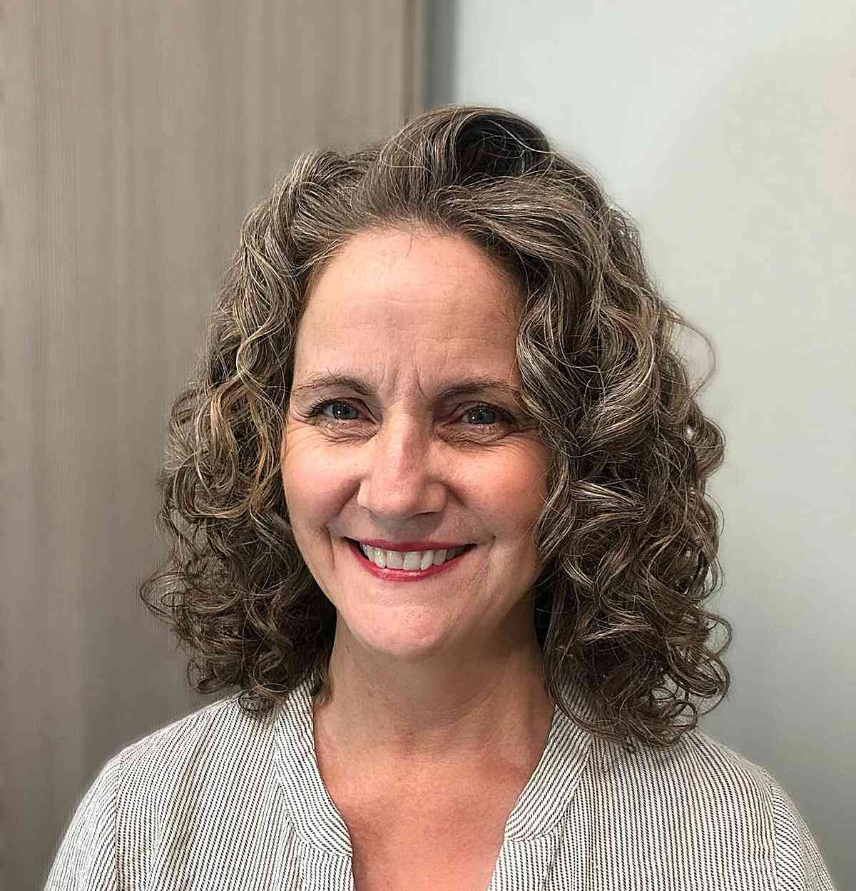 Curls That Wow: 27 Hairdos for Women Over 60 with Curly Hair