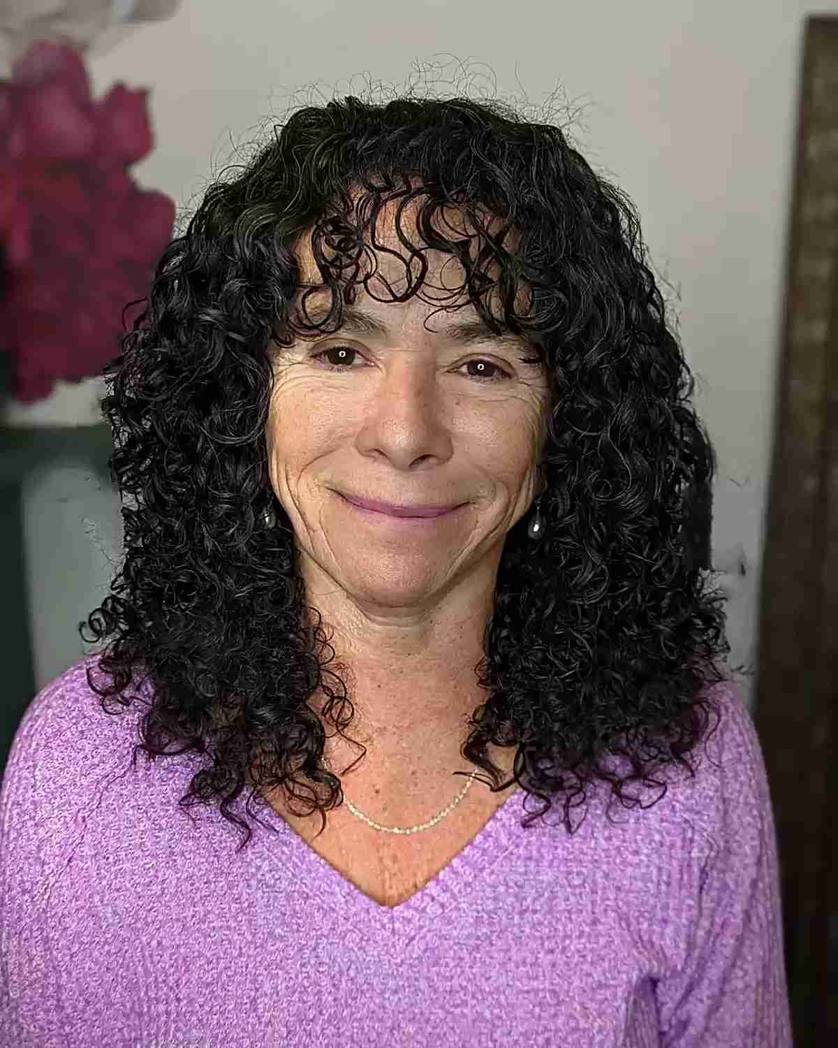 Curls That Wow: 27 Hairdos for Women Over 60 with Curly Hair