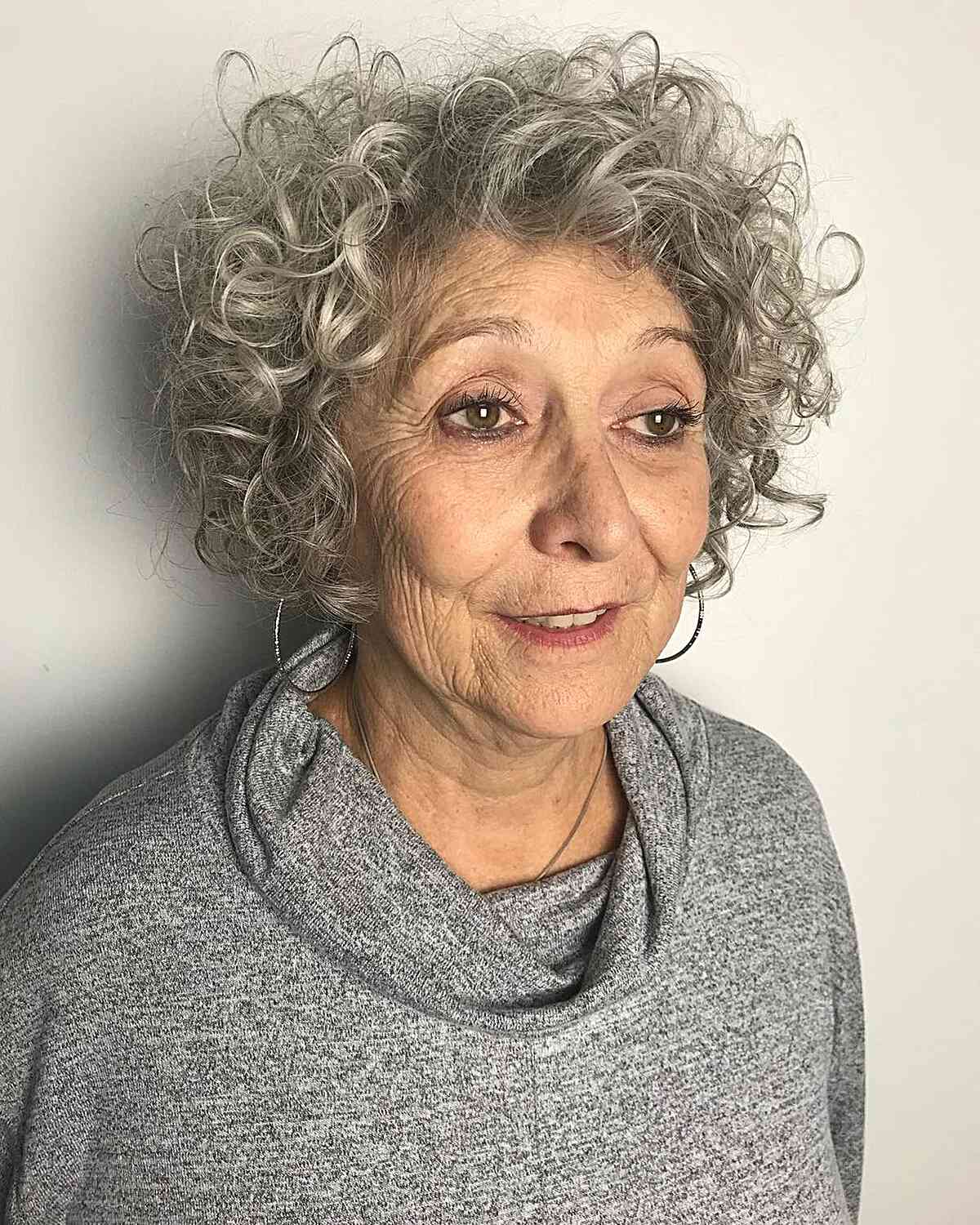 Curls That Wow: 27 Hairdos for Women Over 60 with Curly Hair