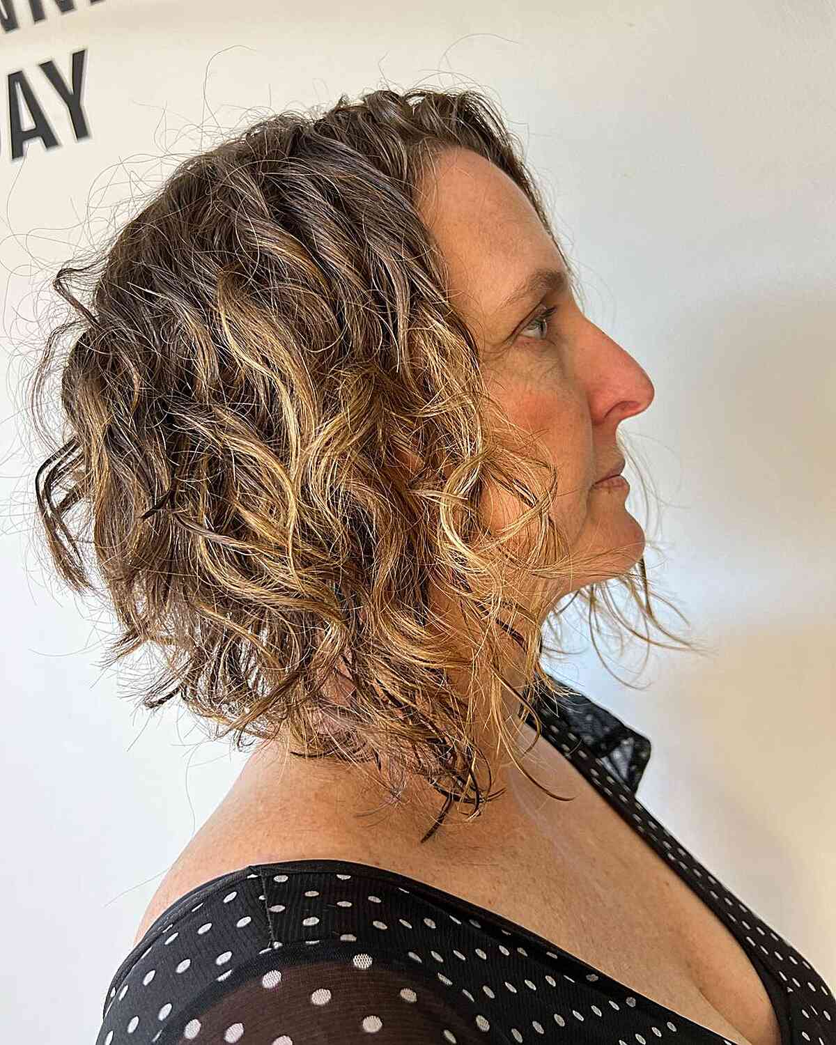 Curls That Wow: 27 Hairdos for Women Over 60 with Curly Hair