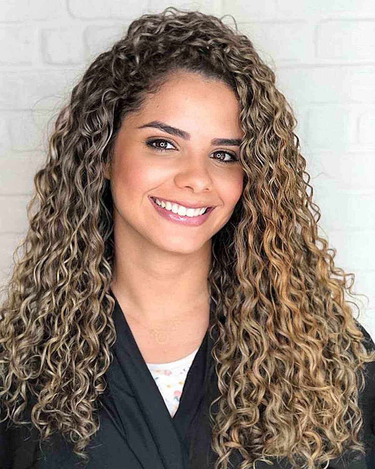 Here’s The Best Way to Get Balayage for Curly Hair