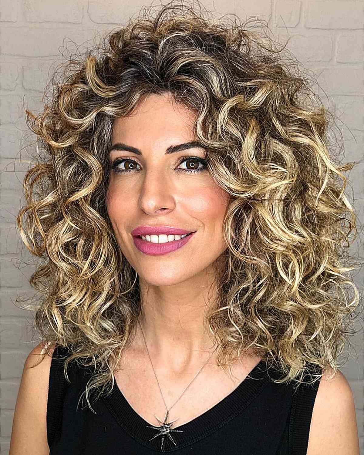 Here’s The Best Way to Get Balayage for Curly Hair