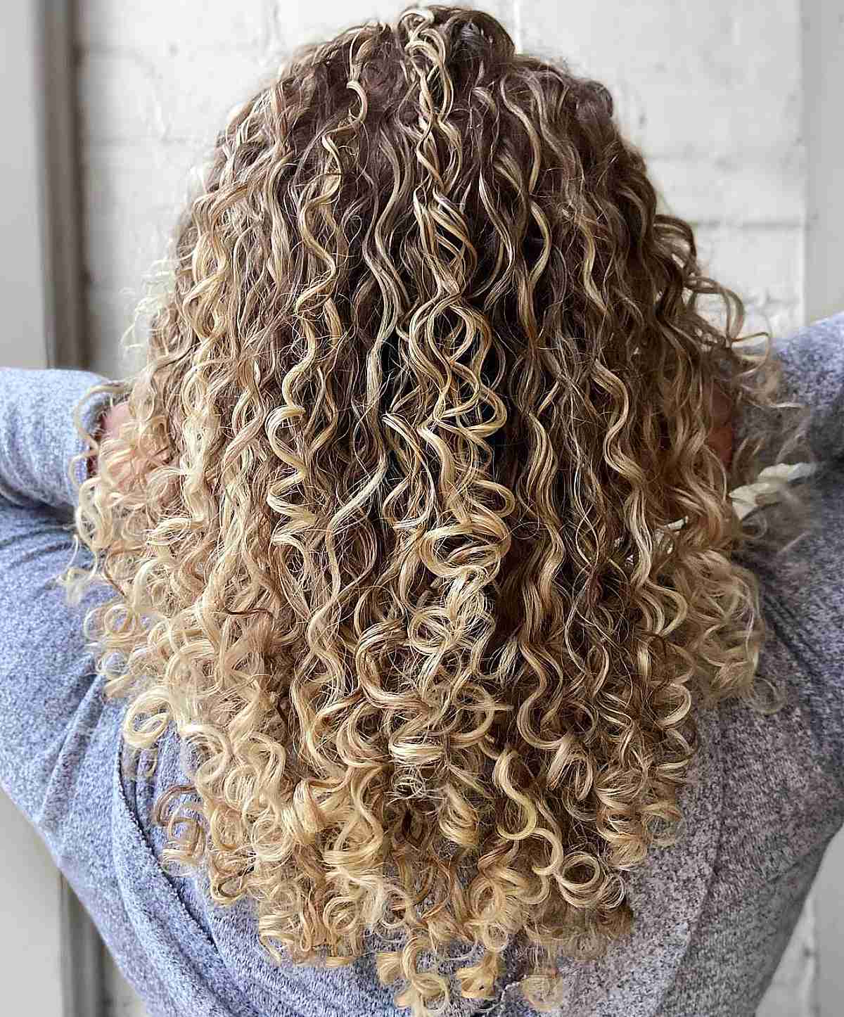 Here’s The Best Way to Get Balayage for Curly Hair