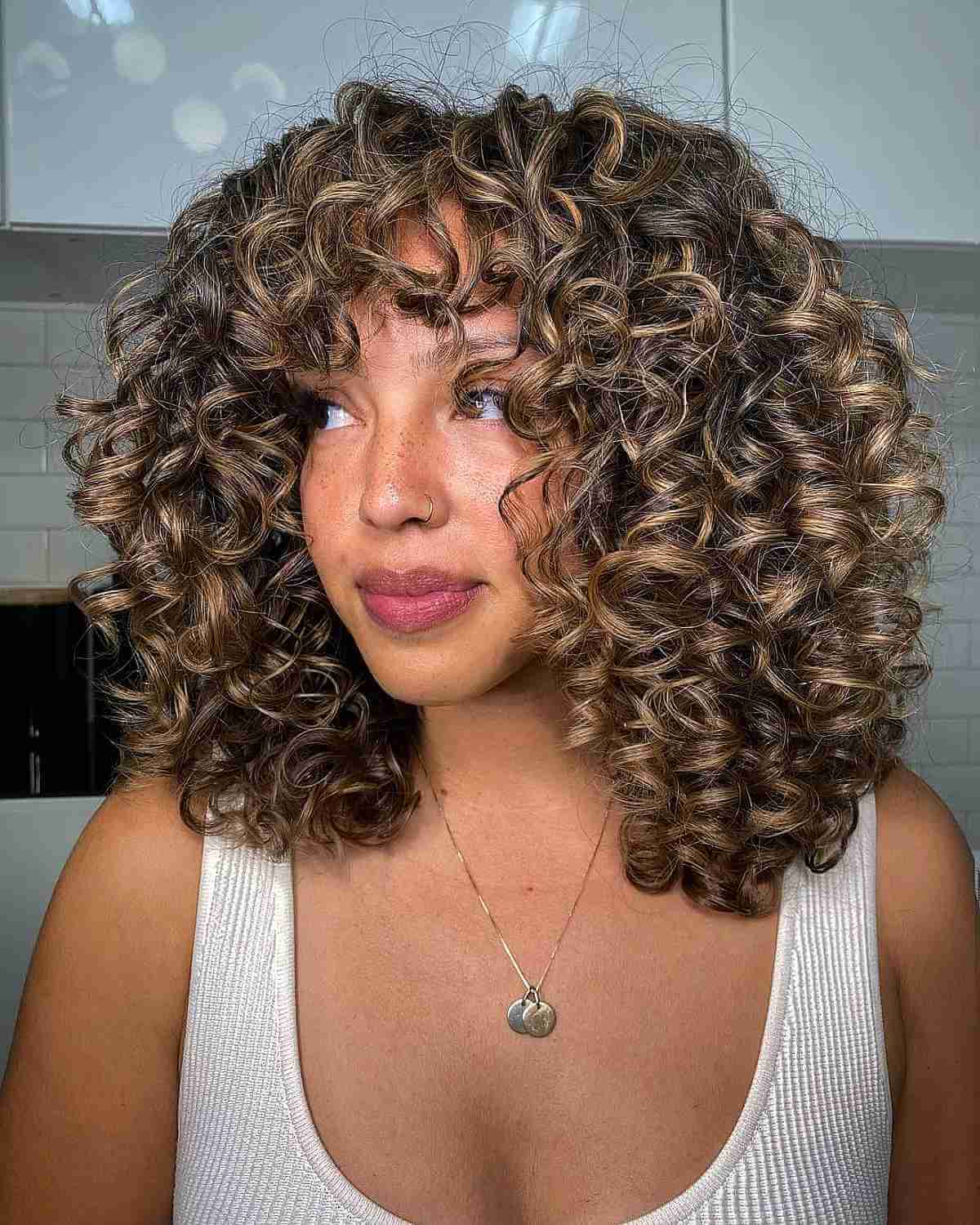 Here’s The Best Way to Get Balayage for Curly Hair