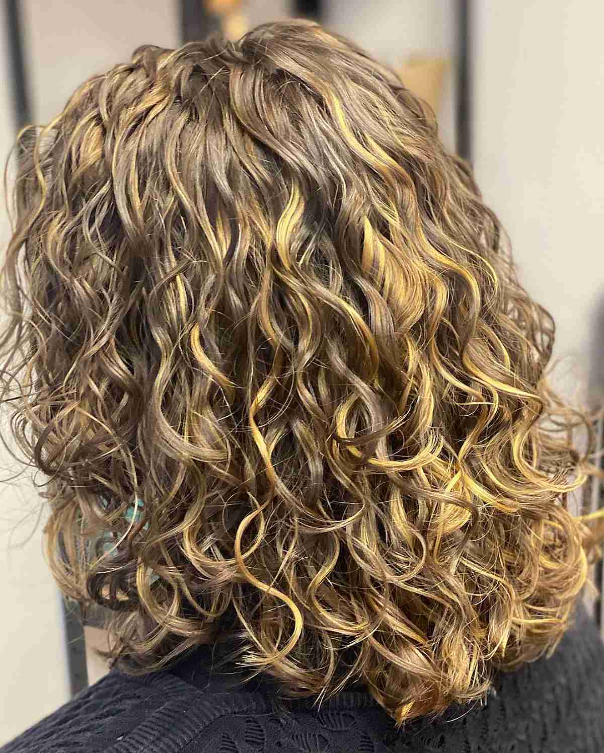 Here’s The Best Way to Get Balayage for Curly Hair