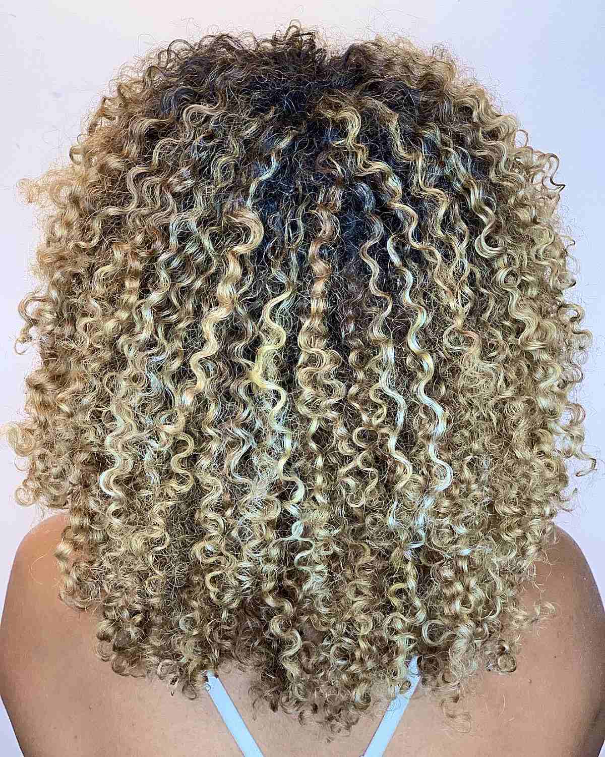Here’s The Best Way to Get Balayage for Curly Hair