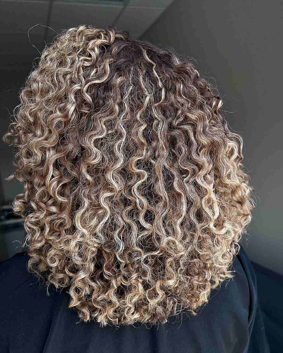 Here’s The Best Way to Get Balayage for Curly Hair