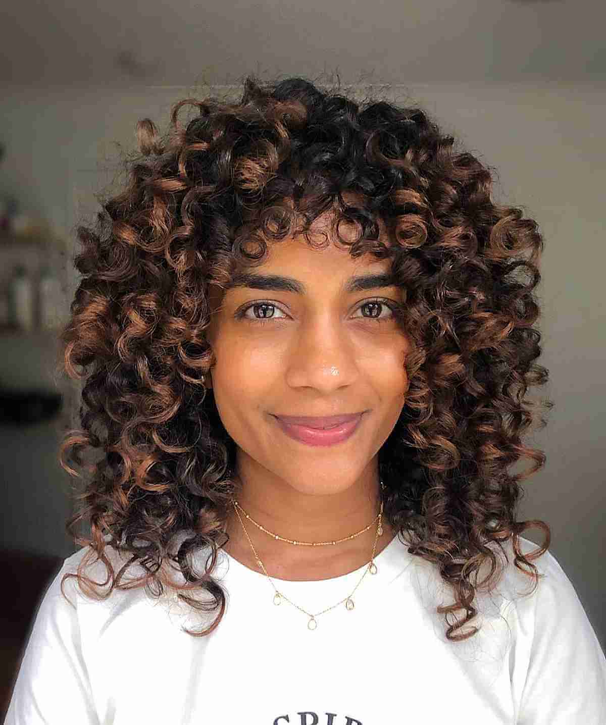 Here’s The Best Way to Get Balayage for Curly Hair