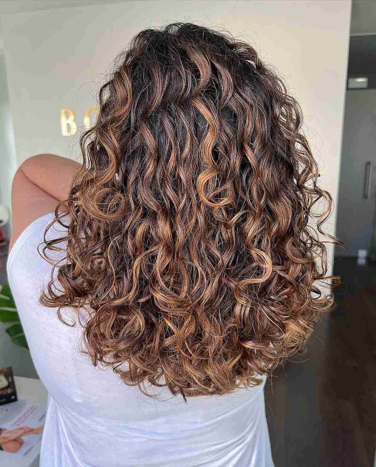 Here’s The Best Way to Get Balayage for Curly Hair