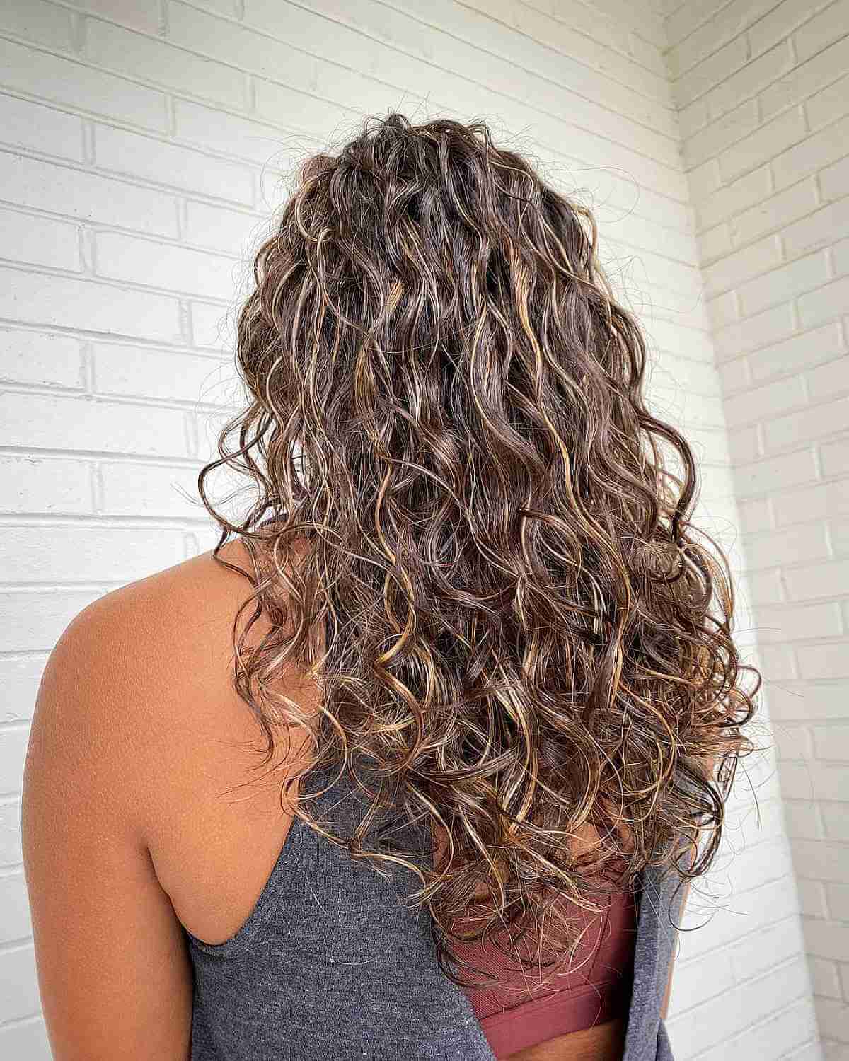 Here’s The Best Way to Get Balayage for Curly Hair