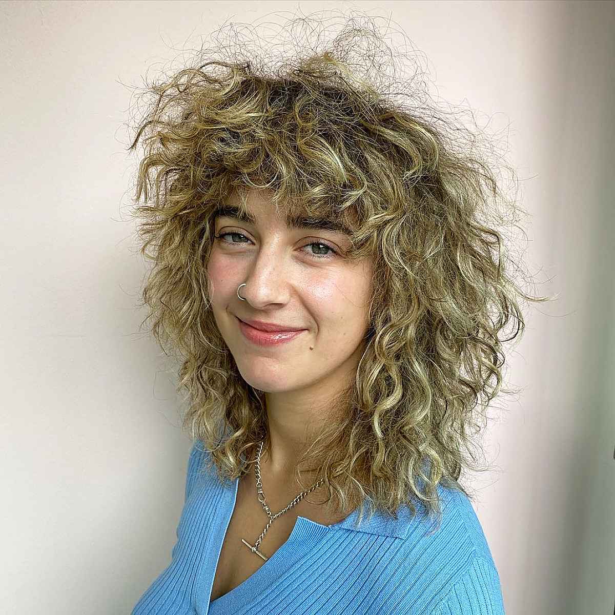 26 Coolest Wolf Cuts for Curly Hair Girls with Style