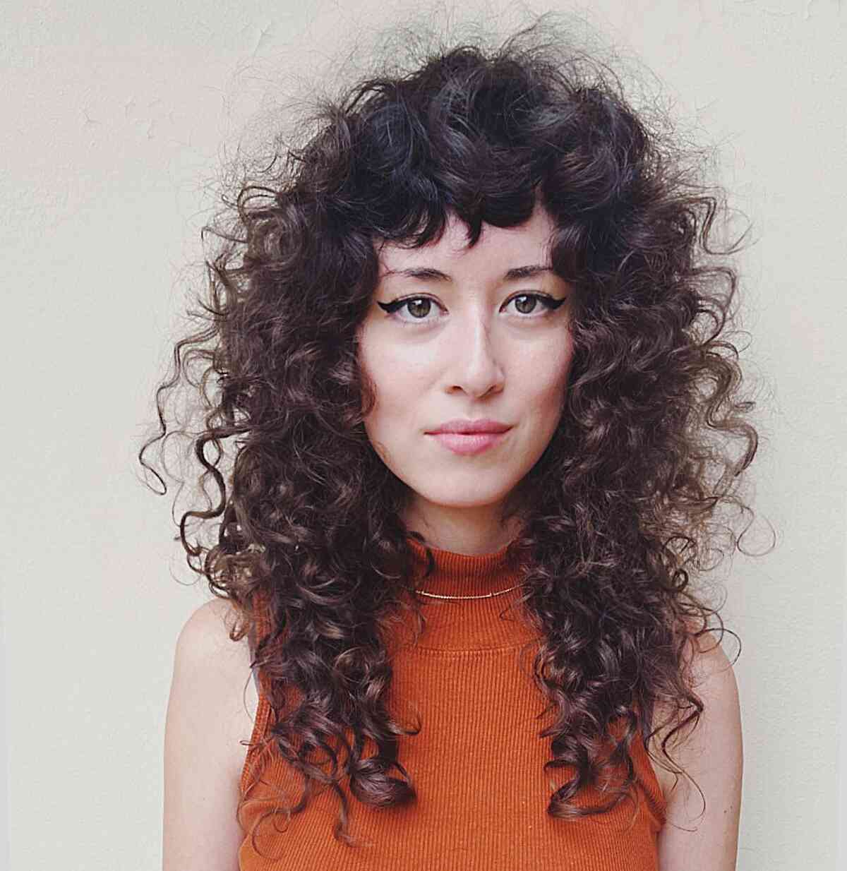 How to Pull Off The Curly Shag Haircut