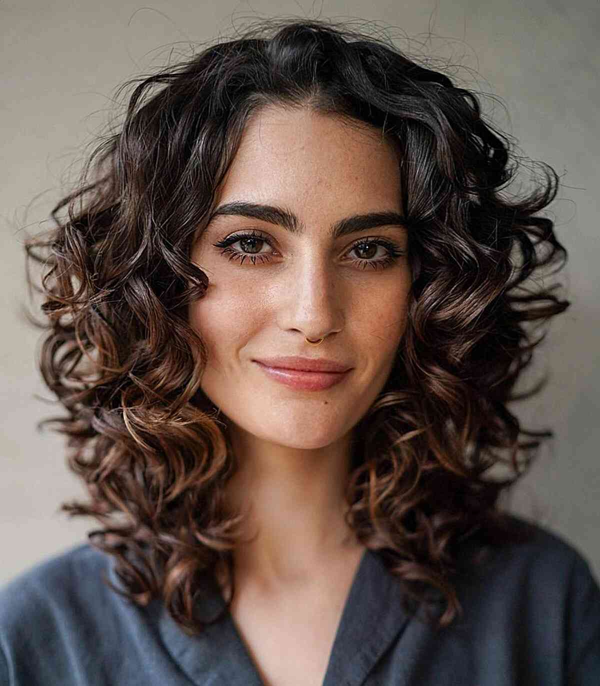 How to Pull Off The Curly Shag Haircut