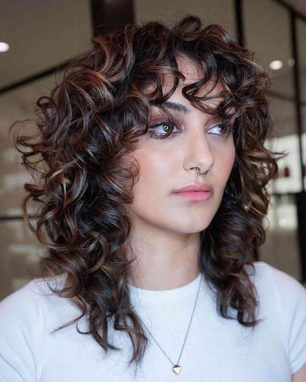 How to Pull Off The Curly Shag Haircut